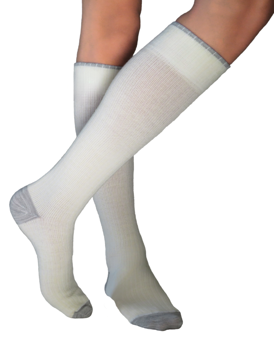 A pair of natural and grey colour merino wool knee-high compression socks worn on a model&