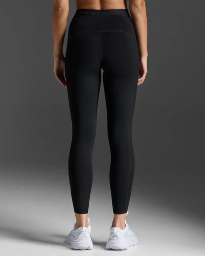 Back view of 2XU Form Stash Hi-Rise Compression Tights in black showing the high-rise waistband and flattering fit.