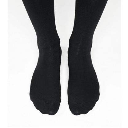 Foot close up YoU Compression ® Black Knee High Socks, 15-20 mmHg mild support for flying and working.
