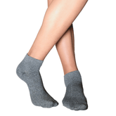 Front and side view of a person wearing YoU Compression grey marl ankle socks featuring a 20-30 mmHg tight, supportive fit on a model against a clean white background.